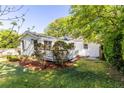 Secluded backyard with a deck and lush greenery, providing privacy and tranquility at 1421 Smith Se St, Atlanta, GA 30316
