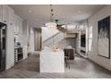 Contemporary kitchen with a marble island, modern appliances, and an open layout at 995 Sw Sparks St, Atlanta, GA 30310