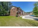 Beautiful townhome exterior showcasing brick facade, well-kept lawns, and inviting curb appeal at 3155 Boldmere Se Trl # 3, Smyrna, GA 30080