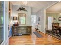 Inviting entryway featuring hardwood floors and an elegant mirror at 3945 Lorien Way, Kennesaw, GA 30152