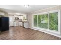 Bright and airy kitchen with stainless steel appliances and white cabinetry at 474 Waterford Nw Rd, Atlanta, GA 30318
