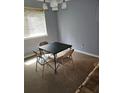 Bright room featuring neutral walls and a table with chairs, perfect for a game or reading at 908 Pine Oak Trl, Austell, GA 30168