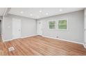 Spacious living room with hardwood floors, a light gray walls, and a bright natural light at 2450 Elkhorn Dr, Decatur, GA 30034