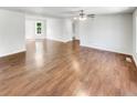 Spacious living area with beautiful wood flooring and ample natural light at 45 Carroll St, Temple, GA 30179