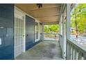 Covered porch with railing offers an inviting outdoor space at 1290 Campbellton Sw Rd, Atlanta, GA 30310