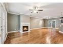 Spacious living room boasts gleaming hardwood floors and a cozy fireplace at 737 St Charles Ne Ave, Atlanta, GA 30306