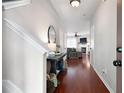 Entryway with hardwood floors, a console table, and an open view into the living room at 1396 Dolcetto Nw Trce # 12, Kennesaw, GA 30152
