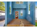 Inviting front porch showcasing the home's architectural detail and a warm welcome with its striking red door at 281 Griffin Nw St, Atlanta, GA 30314