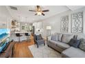 Inviting living room with hardwood floors and an open floorplan to the kitchen at 734 Frasier Se Cir, Marietta, GA 30060