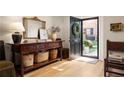 Inviting foyer featuring hardwood floors and a classic console table at 266 Adair St, Decatur, GA 30030
