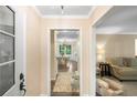 Inviting foyer leading to a dining area and living room. Neutral walls, hardwood floors at 4628 Mountain Creek Ne Dr, Roswell, GA 30075
