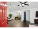 Bright entryway with hardwood floors leading to a dining area and modern kitchen at 360 New Jersey Nw Ave, Atlanta, GA 30314