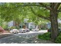 Charming exterior view of the complex, with lush greenery and ample parking at 1244 Weatherstone Ne Dr, Atlanta, GA 30324