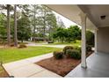 Spacious front porch with well-maintained landscaping and charming curb appeal at 2903 Bonanza Dr, Decatur, GA 30033