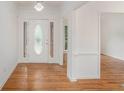 Bright foyer with hardwood floors, leading to other rooms in the house at 1721 Druids Se Xing, Conyers, GA 30013