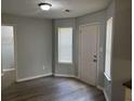 Inviting living room with new vinyl floors, fresh paint and ample natural light at 4817 Hidden Creek Place, Decatur, GA 30035