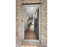 Inviting entryway showing hardwood floors and an open floor plan at 137 White Mountain Pass, Mcdonough, GA 30252