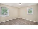 Neutral bedroom with large windows and natural light to enjoy the outdoors at 310 Oak Se Dr, Atlanta, GA 30354