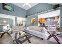 Bright living room with vaulted ceilings, neutral paint, and open access to other rooms at 31 Churchill Downs Ne, Cartersville, GA 30121