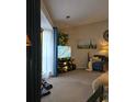 Comfortable living room featuring a TV, plush seating, and tasteful decorations at 6193 Charring Cross Ct, Lithonia, GA 30058