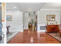 Grand foyer with gleaming hardwood floors and elegant trim details at , Cumming, GA 30041