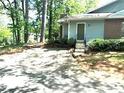 A quaint one-story home featuring a clean and simple design, perfect for a serene living environment at 4828 Westridge Dr, Norcross, GA 30093