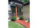 Charming front entrance with brick facade and fresh mulch at 3629 Embry Cir, Atlanta, GA 30341
