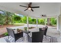Comfortable patio seating area with ceiling fans, ideal for enjoying the outdoors at 5766 Macland Rd, Powder Springs, GA 30127