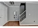 Inviting entryway with hardwood floors and a staircase leading to the upper level at 5554 Clover Rise Ln, Norcross, GA 30093