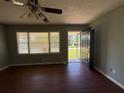 Living room with new flooring and ample natural light from the large window at 4416 Arcadia Dr, Norcross, GA 30093