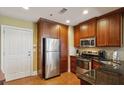 Updated kitchen boasts stainless steel appliances, granite countertops, and ample cabinet space at 2277 Peachtree Ne Rd # 701, Atlanta, GA 30309