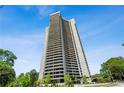 A full exterior shot of the high rise condominium building with balconies at 2660 Peachtree Nw Rd # 4G, Atlanta, GA 30305