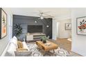 Stylish living room featuring modern decor, recessed lights, and an open floor plan at 1258 Lyle Ave, Atlanta, GA 30344