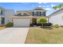 Charming two-story home boasts a well-kept lawn and a practical two-car garage at 357 Ridgewood Trl, Canton, GA 30115