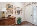 Welcoming foyer featuring hardwood floors, decorative mirror and console table at 156 Kendrick Farm Ln, Marietta, GA 30066