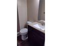 Vanity and toilet in this bathroom with tiled walk-in shower at 3088 Balearic Dr, Marietta, GA 30067