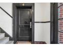 Interior shot of a townhouse apartment door with black trim and hardware at 974 Greenwood Ne Ave # 6, Atlanta, GA 30306