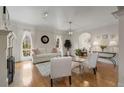 Inviting living room boasts hardwood floors, neutral decor, and ample natural light at 735 Neel Reid Dr, Roswell, GA 30075