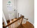 Open foyer with staircase and large window, showcasing ample natural light at 1988 Claiborne Ct, Marietta, GA 30062