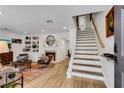 Inviting living room with fireplace, built-ins and staircase at 2495 Northlake Ne Ct, Atlanta, GA 30345