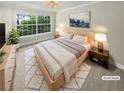 Cozy bedroom with large window, soft lighting, and stylish contemporary decor; staged at 6980 Roswell Rd # J6, Atlanta, GA 30328