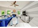 Bright living room featuring stylish furnishings, a cozy fireplace, and ample natural light at 236 Bobbie Way, Woodstock, GA 30189