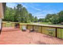 Spacious outdoor deck with seating, perfect for entertaining or enjoying the view at 6450 Ivey Se Rd, Mableton, GA 30126