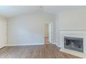 Living room view showcasing fireplace and open floor plan at 8051 Trinity Park Dr, Riverdale, GA 30296