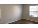 Bright bedroom with new blinds, and a neutral color palette, ready for personal touches at 1304 Old Coach Sw Rd, Marietta, GA 30008