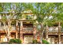 Charming brick townhome featuring a garage, cozy balcony, and well-maintained landscaping at 833 Charles Bank Se Ave, Atlanta, GA 30312