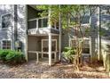 Enclosed patio with outdoor space, privacy fence and mature trees at 8106 Santa Fe Pkwy, Atlanta, GA 30350