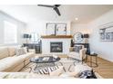 Bright living room with a fireplace, neutral decor, and stylish furnishings at 1712 Fulmont Cir, Mableton, GA 30126