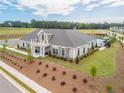 Beautiful clubhouse with a balcony, stone accents, pool, and ample parking in a well-maintained community at 3472 Fishpond Cir, Dacula, GA 30019