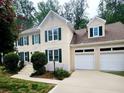 Beautiful two-story home featuring a two-car garage and traditional architectural details at 2980 Milford Sw Trl, Marietta, GA 30008